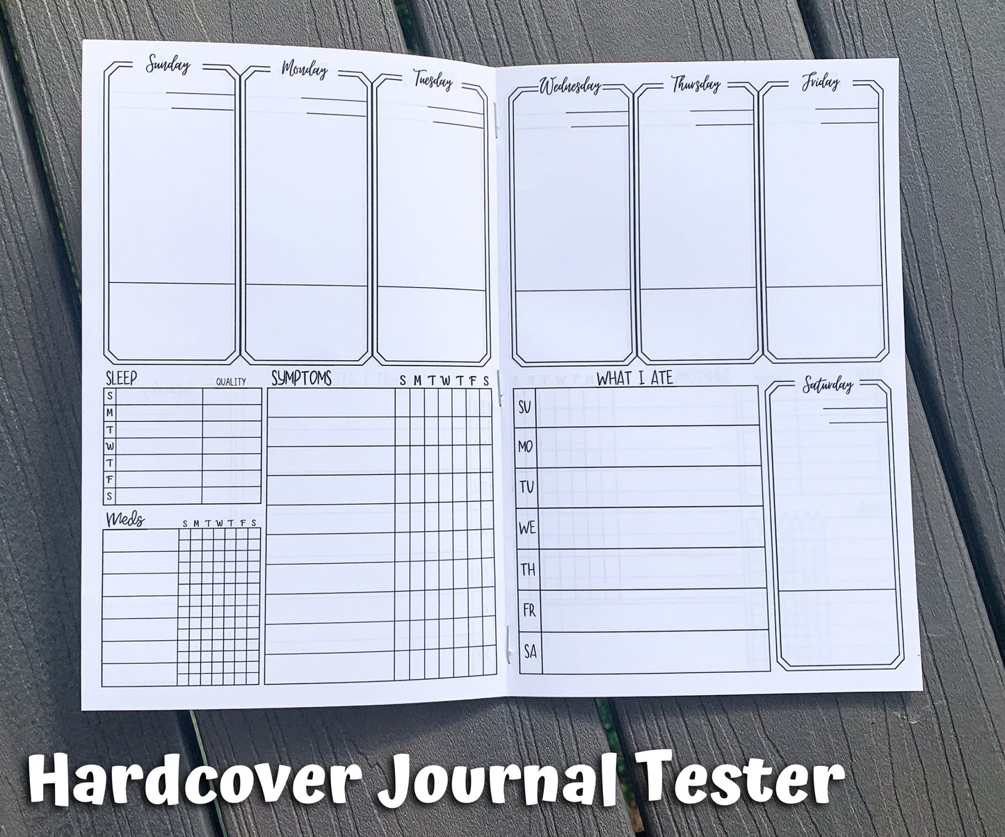 Another page of the hardcover tester is shown open, the only difference is that this page does not have an empty box below the symptom tracker, it just goes to the bottom of the page and the writing space is larger. Each tracking box at the bottom has space divided for each day of the week.