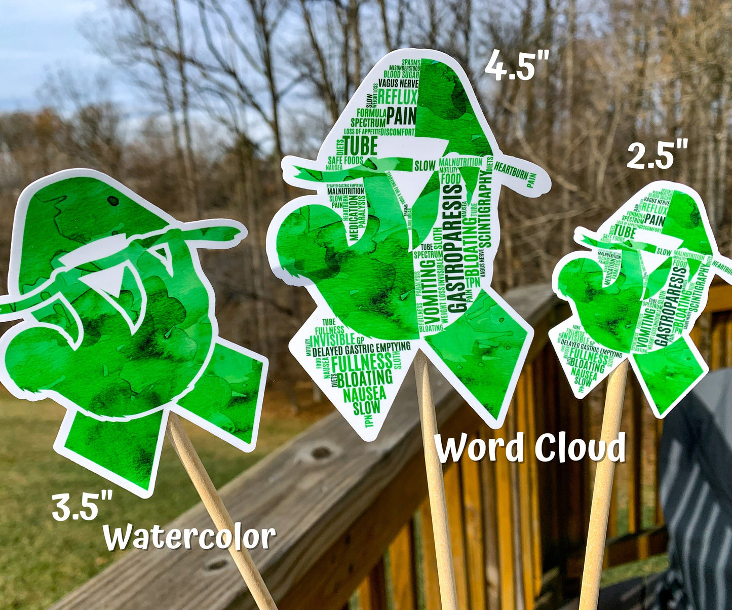 3 sizes of the stickers are shown. 3.5 inch, 4.5 inch, and 2.5 inch. It also shows that the watercolor design is all color and no word cloud and the word cloud is the design with each section split in half with the word clouds