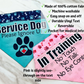 Bandanas in blue and pink are shownm it is noted that the pink is slightly see through on the text side. A checklist states the following Made of 100% cotton fabric, machine washable, easy snap on and off, durable vinyl text, reversible, pocket for medical info