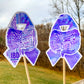 The word cloud and watercolor designs are shown on 2 sticks. Both ribbons feature a purple color awareness ribbon with intestines in the center. The word cloud design on the left is split in half with a word cloud on the left half of the ribbon and right half of the intestines.