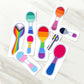 9 Stickers are shown on a marble surface. Each sticker is shaped like a spoon, with a grey border. The inside of the spoons have the flags of different LGBTQ pride flags horizontally, except for the progressive pride and straight ally flags. There are 3 sizes shown- 2 1/2 inch, 3 1/2 inch, and 4 1/2 inch.