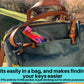 A brushstrokes rainbow wristlet is shown sticking out of the pocket of a dark teal purse. A note says fits easily in a bag, and makes finding your keys easier. Fits entirely in the pocket, is just sticking out for photo purposes.