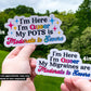 The Pansexual Flag POTS sticker from the first photo is noted as being 5 inches and shown next to the 4 inch Bisexual flag migraine sticker. A note says sizes are approximate, may vary based on text requested.